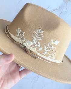 "Hand embroidered, unique, floral embroidered wide brim felt hats. Custom designed hats!  hoods between hat colors, design and band options. These are great hats for family photos, concerts, outdoor get togethers, vacation, sun hat, and more! Super cute and stylish for all occasions.   Listing is split by design and hat color (I.e. black #1 is a black hat with design #1)  Hat details:  65% cotton, 35% polyester One size,but fits all most women Adjustable strap inside of the fedora hat Hat Circumference: 56-58cm/22-22.8\"; Brim Width: 7cm/2.76\"；Height: 11cm/4.3\". if you do not want desired band option-simple black leather band will be provided. FREE SHIPPING" Embroidered Felt Hat, Embroidered Cowboy Hat, Felt Hats For Women, Hat Embellishments, Black Wide Brim Hat, Cowboy Hat Design, Stray Dog Designs, Hat Burning, Wide Brim Felt Hat