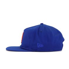 Adjustable hat. Cap is "One Size Fits Most" (OSFM). New Era Cap Golfer snapback hat for the New York Mets in official team colors. The Golfer Snapback is built for two things: durability and comfort. The unstructured crown actually allows the hat to be more durable, affording more flexibility to the adjustable hat. Use of premium cotton keeps the hat lightweight so it’s easy to keep this on for longer periods of time. Sweatband and mesh lining on the inner part of the front keeps sweat from gett Blue Baseball Cap With Logo Patch, Blue Flat Bill Fitted Hat With Logo Patch, Blue Fitted Hat With Logo Patch And Flat Bill, Blue Baseball Cap For College During Baseball Season, Blue 5-panel Baseball Cap With Logo Patch, Blue Baseball Cap With Logo Patch And Flat Brim, Blue Snapback Hat With Logo For Baseball Season, Blue Snapback Hat With Logo Patch For Sports, Blue Snapback Hat With Logo Patch