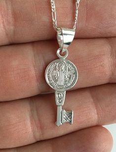 "925 STERLING SILVER SAINT BENEDICT KEY NECKLACE 20\" LONG... FOR GOOD LUCK ,PROSPERITY AND PROTECTION. MADE IN ITALY-BEST QUALITY PENDANT : 32x11mm CADENA DE SAN BENITO EN 925 PLATA ESTERLINA 20\" LARGO .. PARA PROSPERIDAD, BUENA SUERTE Y PROTECCION. HECHO EN ITALIA-MEJOR CALIDAD DIJE: 32x11mm" Personalized Silver Jewelry For Good Luck, Silver Engraved Charm Necklace For Good Luck, Good Luck Silver Engraved Charm Necklace, Good Luck Engraved Silver Charm Necklace, Good Luck Silver Engraved Charm Necklaces, Adjustable Nickel-free Necklace For Good Luck, Silver Necklace With Two Keys For Gift, Silver Key Necklace For Gift, Silver Pendant Necklace With Two Keys