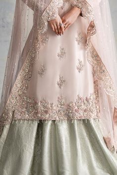 The embellished Nikkah Dress in Lehenga Kameez Style is an elegant masterpiece adorned with Hand-crafted details of Zardosi and Crystals. Fast shipping. Lehenga Designs Embroidery, Light Pink Nikkah Outfit, Light Pink Pakistani Dress, Baby Pink Nikkah Dress, Nikkah Dress Pakistani Simple, Nikkah Dress Pakistani Pink, Pink Nikkah Dress, Simple Bridal Outfit, Bridal Nikkah Dresses