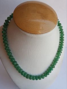 PRODUCT DESCRIPTION :--- 314 Carats Beautiful Carving Designer Beryl Emerald Loose Beads For jewelry making Stone Name :-- Beryl Emerald Gemstone Shape:-- rondelle Carving Color :-- Green Quality: AAA Size : -8-11 MM approximate Pieces :--64 beads + 4 silver plated extension Delivery timeframes (from date of shipping) - USA: ~2 weeks - Rest of the World: ~ 3-4 weeks The photographs of the items have been taken in natural daylight, without any enhancements or affects and all attempts have been ma Classic Green Beaded Necklaces With Round Beads, Jade Necklace With Spacer And Round Beads, Jade Beaded Necklaces With Faceted Beads, Jade Necklace With Spacer Beads, Emerald Necklace With Round Gemstone Beads, Jade Beaded Necklace With Faceted Beads, Emerald Rondelle Gemstone Bead Necklaces, Faceted Round Emerald Bead Necklace, Luxury Polished Rondelle Emerald Bead Necklace