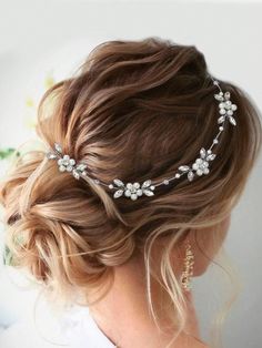 a woman wearing a bridal hair comb