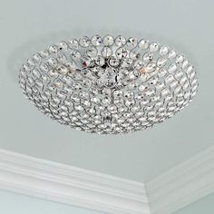 a crystal chandelier hanging from the ceiling