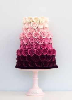 a multi - tiered cake with roses on top is featured in the magazine's cover