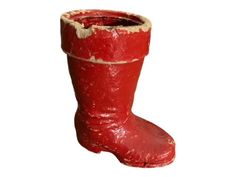 a pair of red boots sitting on top of each other