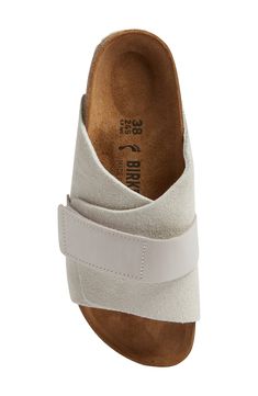 A contoured, cork-textured footbed with a deep heel cup puts support and comfort under every step in a slide sandal topped with a mix of soft leathers. Support: enhances the fit with targeted contouring and cushioning in the footbed Adjustable hook-and-loop strap Contoured, cushioned footbed with arch support Flat sole Leather upper and lining/synthetic sole Made in Germany Birkenstock Kyoto, Recovery Sandals, Flats With Arch Support, Arch Support Shoes, Pretty Shoes Sneakers, Sandals Outfit, Shoe Pattern, Womens Slides, Leather Shoes Woman