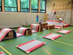 children are playing on an indoor trampoline course