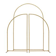 a gold metal arch with two sides