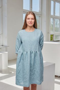 Soft linen smock dress with pockets and 3/4 sleeves. Simple and versatile look that will never get outdated!Handmade from washed and softened medium weight 100% linen.DESCRIPTION:-High quality European linen (OEKO-TEX certified);-Color in pictures: turquoise and peach (other colors please choose on the right);-Medium weight linen;-Not transparent;-Softened;-Doesn't shrink anymore;-No need to iron.SIZES:For perfect fit please send us your bust and hip measurements when ordering! We will make a ta Spring Dresses With Pockets And Half Sleeves, Relaxed Fit Smock Dress For Daywear, Oversized Spring Dress With 3/4 Sleeve, Oversized Dresses With 3/4 Sleeve For Spring, Daywear Tunic Dresses With Pockets, Tunic Dresses With Pockets For Daywear, Spring Lagenlook Dress With Pockets, Spring Linen Dress With 3/4 Sleeves, Relaxed Fit, Summer Linen Dress With 3/4 Sleeves