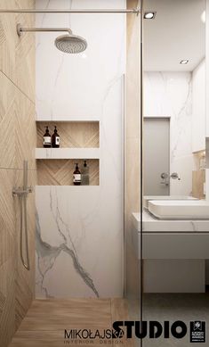 a bathroom with a shower, sink and shelves on the wall next to each other