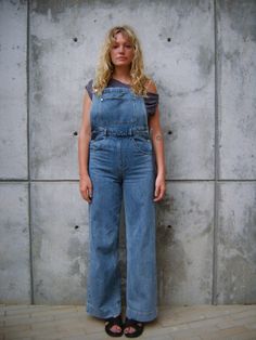 Featuring a bib front with a patch pocket, this denim overall is a take on a classic, with adjustable straps, an open back, and wide legs for a relaxed fit. Adjustable straps Wide leg opening Patch bib pocket Open back Back patch pockets Inseam: 33 ¼” 100% Cotton Machine wash with like colors. Do not bleach. Tumble dry low. Iron cool. Do not dry clean. Back Back, Bib Overalls, Back Patch, Wide Legs, Low Iron, Wide Leg Denim, Sales Gifts, Dress Accessories, Patch Pocket