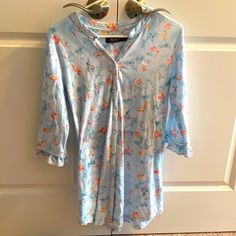 Nwot Lauren Ralph Lauren. Button Down Sleep Shirt. No Collar. Ruffled 3/4” Sleeve Length. Color Aqua Print. Purchased At Macys. 2 Avail. One Small And One Medium. Purchased Before A Procedure But Never Needed Or Worn. Has Been Washed Once In Tide Free And Clear Detergent. Purchased At Macy’s. Lovely Happy Floral Print Light Blue Background With Coral And Light Peach Flowers. 60% Cotton. 40% Rayon. Runs True To Size. Great Condition Never Worn Just Washed Why No Tags. Just Never Needed After Surg Blue Floral Print Long Sleeve Sleepwear, Blue Cotton Sleepwear With Button Closure, Blue Button-up Sleepwear With Button Closure, Spring Blue Sleepwear With Button Closure, Blue Spring Sleepwear With Button Closure, Blue Cotton Sleepwear With Buttons, Blue Button Closure Sleepwear For Spring, Spring Button-up Sleepwear For Pajama Party, Button Closure Top For Pajama Party In Spring