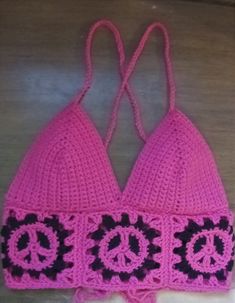 You'll have so much fun wearing this  crocheted crop top this summer with peace signs! ** Custom made to order. This is bubble gum/hot pink! Or you can choose all black top, or one side hot pink and the other black! May also choose any of your favorite colors for the top and peace signs. Trendy Pink Crochet Top, Trendy Crochet Tops For Festival, Trendy Pink Triangle Crop Top, Pink Crochet Crop Top For Vacation, Pink Cotton Crochet Top Trendy, Pink Casual Triangle Crop Top, Pink Triangle Top Crop Top For Vacation, Casual Pink Triangle Crop Top, Casual Handmade Pink Tops