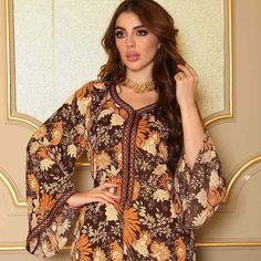 Worldwide Shipping. Shop designer Muslim dresses for women at Urgarment. Find the latest collection of Muslim dresses in different fabrics and colors at the Best Price. Eid Floral Print Long Sleeve Abaya, Floral Print Long Sleeve Kaftan For Eid, Long Sleeve Floral Print Kaftan For Eid, Floral Print Maxi Kaftan For Eid, Long Sleeve Abaya For Beach Eid, Long Sleeve Abaya For Beach And Eid, Long Sleeve Abaya For Eid Beach Occasion, Bohemian Maxi Length Abaya For Eid, Elegant Brown Long Sleeve Thobe