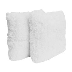 two white pillows sitting next to each other