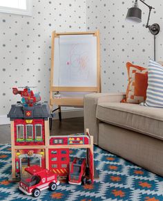 a living room filled with furniture and toys