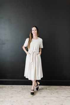 This modest dress has short sleeves and stripes. It is cream with black stripes. It is midi and great for summer and fall. It has pockets and a tie at the waist. Buy now! #stripeddress #modest Modest Dresses For Women, Sweater Maxi Dress, Modest Dress, Modest Dresses, Spring Dresses, Modest Outfits, Fall Dresses