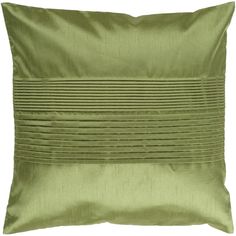 a green pillow with pleated lines on it