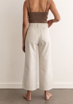 This sale item is final sale. Our favorite foundational trousers are back in a new 100% cotton twill. Designed with a flattering high rise that is fitted through the hips and opens to a comfortable wide leg hem. The new easy, everyday, go with anything trouser. Cut from a new OEKO Tex Certified 100% cotton twill. Garment dyed to reduce shrink and add some softness with a slightly washed finish. Machine wash cold, line dry.Made in India by our Fair Trade Certified partners. We list actual garment Jean Pocket Detail, Layering Jacket, Jean Pockets, Wide Trousers, Knit Alpaca, Favorite Daughter, Denim Gift, Trouser Pants Women, A Perfect Circle