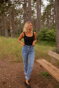 The ribbed fabric offers a soft and stylish touch, while the square neck design adds a touch of sophistication. With a form-fit and fastening at the bottom, this bodysuit is essential for any wardrobe. Elevate your fashion game with this must-have piece. This bodysuit also comes in White Ophelie is also wearing the Blue Maddie Jeans Sizes: S-M / M-L S-M: Length 26.4 in - Width 11.4 in M-L: Length 27.2 in - Width 12.2 in 95% Cotton - 5% Elastane Washing: 86°F Bodysuit And Jeans Outfits, White Bodysuit Outfit, Square Neck Design, Black Body Suit, Bodysuit Outfit, Mom Jeans Outfit, Body Suit Outfits, White Bodysuit, Black Bodysuit