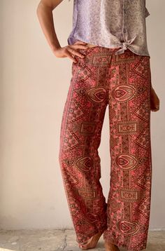 "This may be your new favorite pants , super soft and light trousers Made of bended silk Easy fits with elastic waist Perfect in the city for work or holiday escapades True boho hippie look MEASURE S Waist (stretchy) 30\"-36\" Hips 38\" Leg ( measure from waist ) 38\" MATERIAL  *silk  Thank you for looking" Loosely Fitted Viscose Wide Leg Pants, Viscose Wide Leg Pants With Elastic Waistband, Summer Festival Wide-leg Harem Pants, Ankle-length Viscose Wide Leg Pants With Elastic Waistband, Stretch Viscose Ankle-length Wide Leg Pants, Wide Leg Rayon Lounge Pants, Non-stretch Wide Leg Ankle-length Pants For Vacation, Summer Casual Wide Leg Viscose Pants, Casual Wide Leg Viscose Pants For Summer