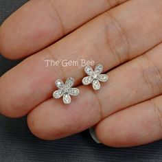 "Thank you for coming in! Extraordinary 14K solid white gold diamond flower Ear posts with backs! 0.15 carat total diamond weight,high quality F-G color, VS-SI clarity. It looks much much nicer in person! It is stamped with \"14k\" which is shown on the back. You'll get one pair per winning! SIZE: 8.6mm Weight: 1.45 gram (approx) MATERIAL: 14k Solid white gold, Diamond" Flower-shaped Cubic Zirconia Diamond Earrings With Accents, Flower Shaped Diamond Earrings With Single Cut Diamonds, Flower-shaped Diamond Earrings With Single Cut Diamonds, Diamond White Flower-shaped Diamond Earrings, Wedding Flower-shaped Diamond Earrings With Single Cut Diamonds, Wedding Flower-shaped Diamond Earrings, Diamond White Flower-shaped Earrings With Diamond Accents, White Diamond Flower-shaped Earrings For Anniversary, Silver Cubic Zirconia Flower-shaped Earrings