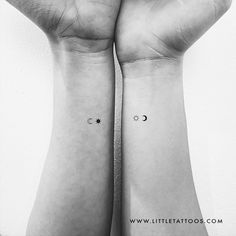 two wrist tattoos with stars and crescents on the wrists, one is black and white