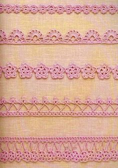 pink crochet trims are lined up against a beige background with white stitching