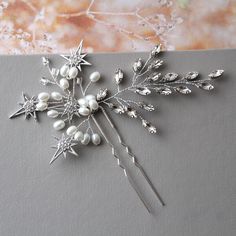 Wedding Hair pin   Bridal Headpiece Wedding  hairpiece  Colour: silver-rhodium tone/clear/pale ivory Size:  vine  approx 4.5-5 inches, width approx 2.5 inches . Materials: metal findings, pale ivory faux pearls, clear rhinestones, silver.clear beads, wire, pin. IDEAL FOR WEDDINGS AND SPECIAL DAYS OUT . Simple packaging as in stock at this moment. MORE with STARS: OTHER HEADPIECES: https://www.etsy.com/uk/shop/DonataleAccessories?ref=simple-shop-header-name&listing_id=683145110&search_query=hair Bridal Hair Pin, Bridesmaid Hair Pins, Wedding Hair Vine, Headpiece Bridal, Star Hair, Bridal Sash, Wedding Hair Pins, Bridal Headpiece, Bridal Hair Pins