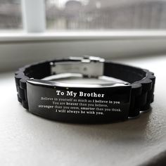 Our Handmade Engraved Stainless-Steel Bracelet transcends style and sentiment and epitomizes thoughtful gifting. Crafted to perfection, this bracelet captures the essence of Brother, making it an exquisite gift choice for all occasions. Message reads: Believe in yourself as much as I believe in you. You are braver than you believe, stronger than seem, smarter than you think I will always be with Personalized Connection: Tailored for Brother, our bracelet carries a message that speaks to the heart. Whether it's Valentine's Day, Father's Day, Thanksgiving, Christmas, birthdays, or anniversaries. this gift is a universal symbol of your love and appreciation. Artisanal Masterpiece: Immerse yourself in handcrafted perfection. Meticulously designed by skilled artisans, this bracelet showcases in Black Bracelets With Engraving Option For Gift, Black Inspirational Friendship Bracelets, Inspirational Black Friendship Bracelets, Personalized Inspirational Black Bracelets, Inspirational Personalized Black Bracelets, Adjustable Black Bracelets With Custom Text, Gifts Brother, Christmas Gifts For Brother, Brother Brother