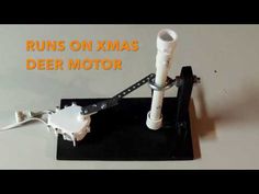 an electronic device that is attached to a piece of paper with the words runs on xmas deer motor