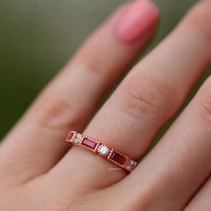 Classic 14k Rose Gold Ruby Ring For Anniversary, Classic Rose Gold Ruby Ring For Anniversary, Heirloom Ruby Ring In Rose Gold For Anniversary, Heirloom Rose Gold Ruby Ring For Anniversary, Rose Gold Stackable Ruby Ring For Anniversary, Stackable Rose Gold Ruby Ring For Anniversary, Rose Gold Emerald Cut Ruby Ring For Wedding, Wedding Rose Gold Ruby Ring With Diamond Cut, Anniversary Rose Gold Stackable Ruby Ring