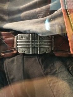 the belt is made out of metal and leather