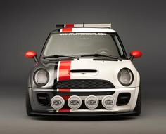 the front end of a white and red mini cooper pace pace pace pace pace pace pace pace pace pace pace pace pace pace pace pace pace pace pace pace pace pace pace pace pace pace pace pace pace pace pace pace pace pace pace