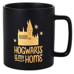 a harry potter mug with hogwarts is my home