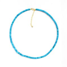 Embrace the serene beauty of our Tranquil Seas Turquoise Necklace, handcrafted to embody coastal elegance with stones sourced from the azure waters. Revered across cultures for its protective properties and ability to promote inner calm, turquoise symbolizes wisdom and nobility.  Perfect for any occasion, this necklace combines natural turquoise with a 925 gold-plated sterling silver clasp, ensuring both quality and timeless appeal, capturing the essence of Mediterranean tranquility. Mediterranean turquoise beads and a 14k gold-plated 925 sterling silver clasp  Please note, our turquoise stones may vary slightly in color as they are all genuine and unique, sourced from the azure waters of the Mediterranean. These variations highlight the natural beauty and authenticity of each handmade tur Artisan Blue Jewelry For Beach, Artisan Blue Jewelry For The Beach, Artisan Blue Turquoise Necklace With Gemstone Beads, Artisan Turquoise Jewelry, Turquoise Necklace With Polished Beads For Beach, Artisan Turquoise Necklace With Natural Stones For Beach, Blue Single Strand Turquoise Necklace With Chrysocolla, Blue Turquoise Necklace With Gemstone Beads, Turquoise Single Strand Jewelry For Beach