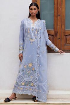 Brand: ELANProduct Code: EL24-01A MINACollection: ELAN Unstitched Embroidered Luxury Lawn CollectionFabric: Lawn DESCRIPTION: Introducing "Neziha," a fashion marvel that embodies sophistication and artistic finesse. Its ice blue canvas provides a serene backdrop, meticulously adorned with contrasting embroidered florals in shades of Laguna yellow, moss, azure, and ivory. Each delicate motif tells a story of natural beauty, intricately woven into the fabric to create a mesmerizing ensemble. The pièce de résistance lies in the harmonious juxtaposition of colors, where each hue enhances the overall allure of the garment. Accompanied by an impeccably crafted dupatta, adorned with complementary embroidery, "Neziha" transcends traditional attire to become a true masterpiece of wearable art. This Elan Lawn, Pakistani Clothes Online, Pakistani Salwar Kameez, Lawn Suits, Traditional Attire, Pakistani Designers, Luxury Bridal, Suit Fabric, Pakistani Outfits