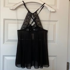 Brand New With Tags And Never Worn! Sexy Silky Black Lace Top With Open Chest. Sheer Stretch Camisole For Night Out, Coquette Camisole Top For Night Out, Black Coquette Top With Built-in Bra, Black Tops With Built-in Bra Coquette Style, Black Stretch Camisole For Date Night, Black Sheer Tops For Night, Black Sheer Camisole For Night, Black Coquette Camisole Top, Date Night Cami With Built-in Bra