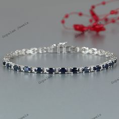 Blue Sapphire Tennis Bracelet-925 Sterling Silver Bracelet-September Birthstone-Diamond Bracelet-14k Gold Bracelet-Wedding Gift for Her-Anniversary Gift-Gift for Wife-Sapphire Jewelry ★ PRODUCT DETAILS ★ * SKU:- BST-514-BS-D3 * Product:- Bracelet * Metal:- Can Choose from Variations (Gold & Sterling Silver) Available * Metal Purity:- Can Choose from Variations (14k Gold & 925 Silver) Available * Bracelet Weight:- 9.62 Gms (Approx.) ★ STONE DETAILS ★ * Stone Name:- Blue Sapphire * Stone Size:- 5x Sapphire Round Bracelets For Wedding, Sapphire Wedding Bracelets, Sapphire Cubic Zirconia Diamond Bracelet For Anniversary, Anniversary Sapphire Diamond Bracelet In Cubic Zirconia, Wedding Sapphire Diamond Bracelet With 17 Jewels, Sapphire Bracelets With Prong Setting For Anniversary, Classic Sapphire Bracelets For Anniversary, Classic Sapphire Tennis Bracelet For Anniversary, Sapphire Gemstone Bracelets For Wedding