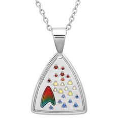 The Star Trek Unisex Stainless Steel Rainbow Pendant is a stylish accessory for displaying one's fandom and makes a suitable gift for any Trekkie. It hangs on a 24 inch chain and is made from durable and shiny stainless steel. This Star Trek pendant is decorated with rainbow crystals scattered across the front as well as the Federation symbol. It is suitable for everyday wear. Size: one size. Color: Metal Type. Age Group: adult. Star Trek Theme, Rainbow Pendant, Timeless Ring, Star Trek Universe, Rainbow Crystal, Just Because Gifts, Unisex Jewelry, Stainless Steel Jewelry, Stylish Accessories