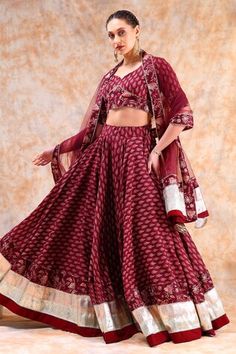 Maroon lehenga with flower print and gota embellished border. Paired with printed blouse and tassel bordered dupatta. - Aza Fashions Bandhani Print Dress For Reception, Traditional Bandhani Print Dress For Reception, Traditional Bandhani Print Sets For Reception, Wedding Palazzo Set With Bandhani Print For Navratri, Navratri Wedding Palazzo Set With Bandhani Print, Eid Bandhani Print Sets For Reception, Traditional Drape Sets With Bandhani Print For Reception, Festive Bandhani Print Set For Reception, Festive Wedding Palazzo Set With Bandhani Print