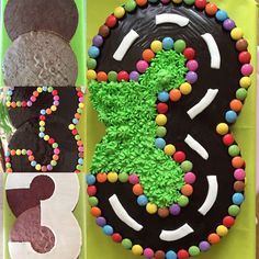 a birthday cake with green frosting and colorful candies on the number eight,