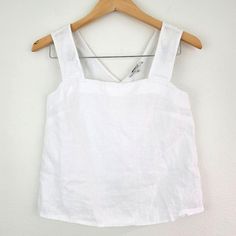 Madewell Irene 100% Linen Cross Back Sleeveless White Top Size 00 Minimalist New Style And Materials: Coming In Breezy 100 Percent Linen, This Square-Neck Tank Has A Relaxed Fit And Crisscross Back. Regular Fit. Length: Designed To Hit Between The Belly Button And High Hip. Minimalist, Boho, Contemporary, Madewell, Linen Size: 00 Please See Photos For Measurements (In Inches) Condition: New With Tags. Flaws: Brand Tag Crossed With Marker. See Pics For More Details. Non Smoking Home All Our Items White Linen Sleeveless Vest, Spring Cotton Tank Top With Wide Straps, Summer Vest Tops With Wide Straps, Spring Everyday Tops With Wide Straps, White Tank Top With Wide Straps For Summer, White Camisole With Wide Straps For Summer, Spring Tops With Wide Straps For Everyday, Cotton Tops With Wide Straps For Summer, White Tank Top With Wide Straps For Spring