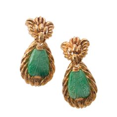 Pair of 18k gold drop earring by David Webb, with carved jade. DESIGNER: David Webb MATERIAL: 18k Gold GEMSTONES: Jade DIMENSIONS: Earrings are 49mm x 24mm. MARKED/TESTED: Webb, 18k. WEIGHT: 45 grams. CONDITION: Previously Owned, Excellent Condition. Luxury Carved Earrings For Formal Occasions, Elegant Carved Earrings For Formal Occasions, Elegant Carved Drop Earrings, Formal Carved Yellow Gold Earrings, Elegant Carved Yellow Gold Earrings, Carved Yellow Gold Earrings For Formal Occasions, Formal Carved Gold Earrings, Formal Gold Carved Earrings, Luxury Jade Earrings For Formal Occasions