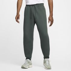 These pants pair the clean aesthetic of Tech with a roomy fit for a relaxed vibe. Our premium, lightweight fleece–smooth both inside and out–gives you plenty of warmth without adding bulk. Nike Tech Dark Green, Nike Tech Hip Pack Green, Grey Tech Fleece Pants, Nike Fleece Bottoms With Moisture-wicking, Nike Tech Fleece Pants, Moisture-wicking Fleece Sweatpants For Streetwear, Nike Tech Fleece, Tech Fleece, Green Pants