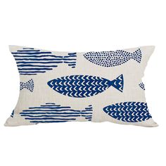 a blue and white pillow with fish on it