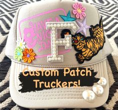 You asked--we answered!  Let us help you build the custom patch trucker hat of your dreams!  Please feel free to message us before placing your order so we can make sure to get it right for you! Customizable Custom Baseball Cap With Curved Bill, Custom White Snapback Hat, Customizable Custom Trucker Hat, Customizable White Trucker Hat, Custom White Trucker Hat, Customizable Snapback Trucker Hat, Customizable Trucker Baseball Cap With 5-panel Design, Customizable Trucker Hat With Curved Bill, Iron On Patch Trucker Hat