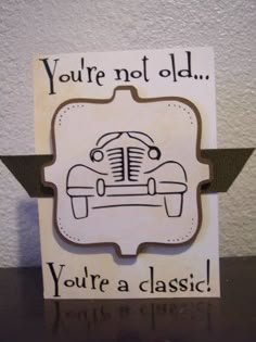 a card that says you're not old, you're a classic on it