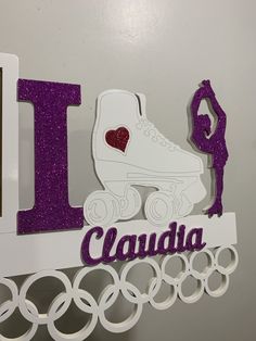 i love cladia with a figure on top of it and the word ice skating