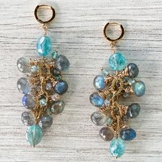 These Sparkling Oria Earrings Are Adorned With Aaa Labradorite And Aaa Blue Zircon. Their Radiance Is Marked By The Labradorite Having The Most Gorgeous Blue Flashes That Compliment Perfectly With The Shimmering Blue Zircon. The Earrings Have Been Meticulously Hand Linked With 18 Kt Gold Filled Wire On 18 Kt Gold Filled Chain And Ear Huggies. Approximate 2” Drop. Shown Here With The Matching Oria Necklace. Handmade. Luxury Blue Briolette Earrings, Blue Multi-stone Earrings For Jewelry Making, Ear Huggies, Light Blue Gemstone, Betsey Johnson Earrings, Glass Drop Earrings, Gold Leaf Earrings, Fruit Earrings, Gemstone Stud Earrings